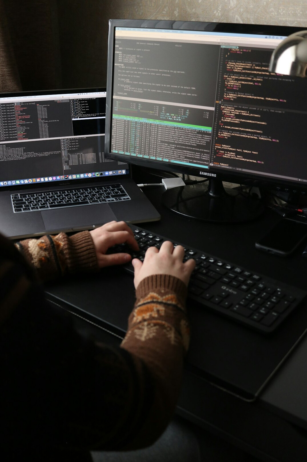 person reviewing code on screen