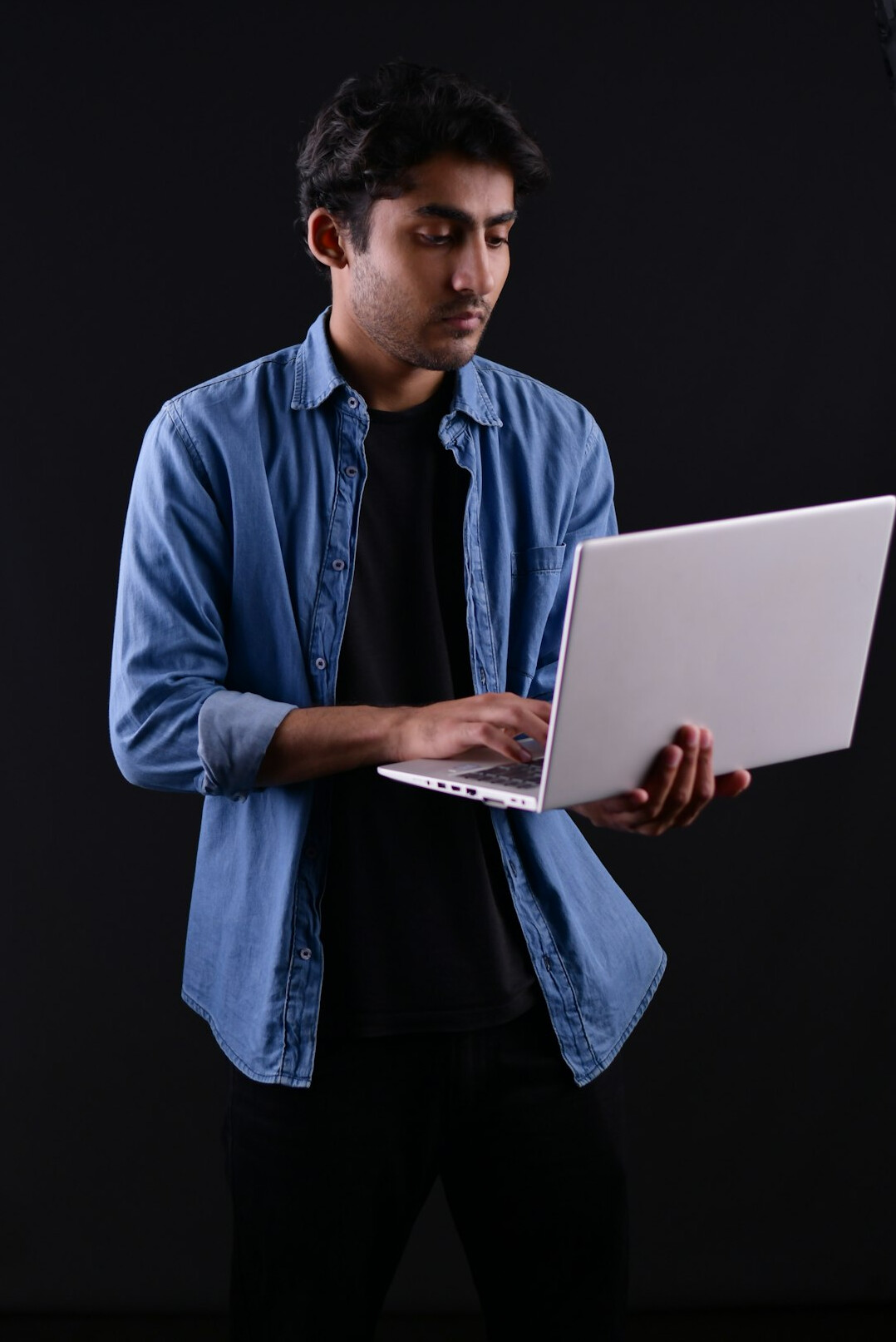 programmer working on laptop