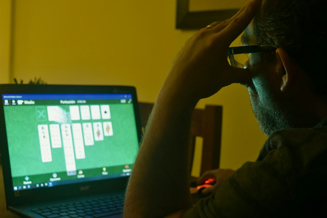 coding on laptop at home